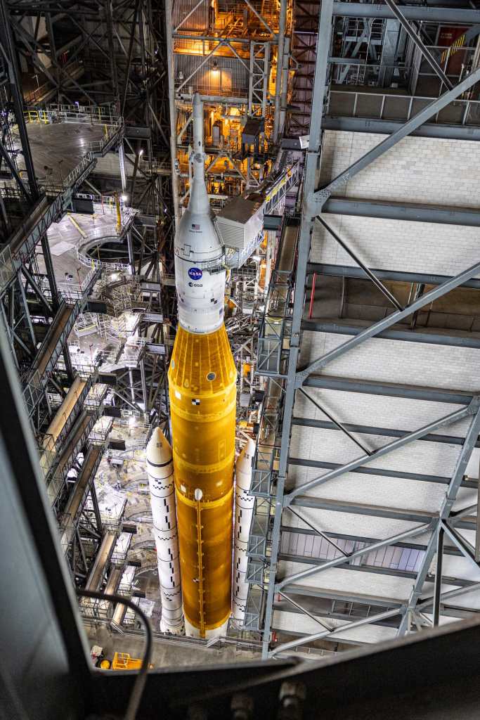 Artemis 1 SLS rocket view from above inside the vehicle assembly building.