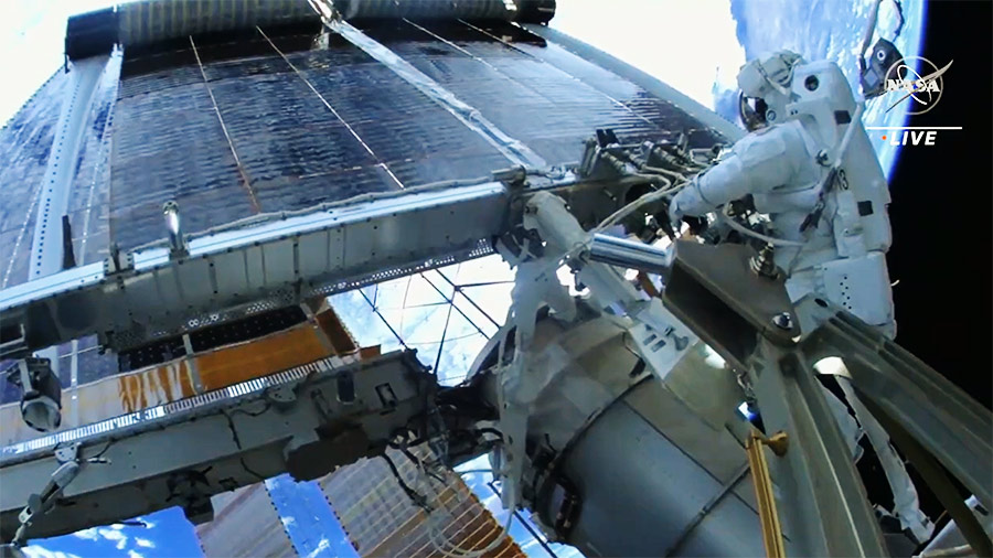 Crew-6 astronauts install the first of two new solar panels on the ISS